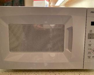 Item 167:  Frigidaire microwave - 17" x 11.5" x 10" tall: $65