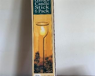 lot 23- garden candle sticks decor $5