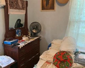 Victorian dresser, full size bed with newer mattresses, linens