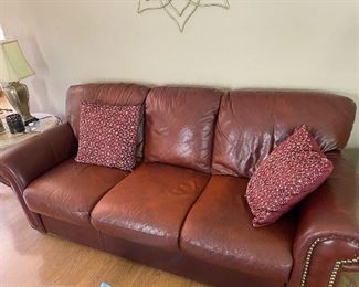 Burgundy Leather Couch $600.00