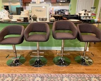 $180 - Set of 4 Adjustable Height Bar / Counter Stools (brown upholstery)