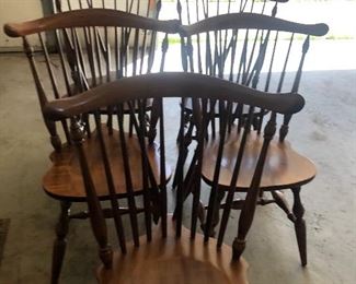 Set of 6 (one is not in the picture) Windsor back chairs in excellent condition