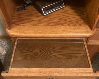 Check out this drawer. It has a glass top and slides so it will sit right in your lap and you can enjoy your evening libation. Come see this Michael Howard Furnishing made in Highpoint NC