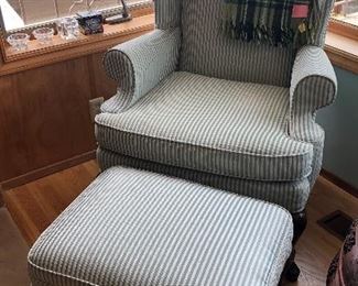 Wingback chair & ottoman with pale blue stripes + green plaid wool throw