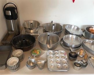 TONS of baking supplies: loaf, bundt & cake pans, muffin tins, molds, biscuit cutters & more