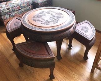 Asian carved round low table with 4 nesting stools - they fit underneath. Table is 29” across, 18” high. Purchased in 1950 in Hong Kong. Includes round glass top (not shown)