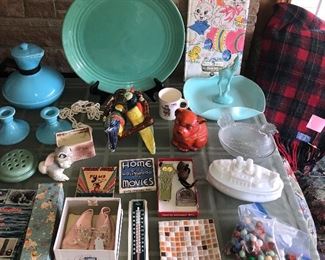 Green Bauer L.A. 15” chop plate, ceramic parrot wall pocket, Twin Winton bunny planter, old Mickey Mouse movies, baby shoes in box, German “Bonzo” tobacco jar (orange dog),  1941 Raggedy Ann mug, covered chicken dish, milk glass ship jar, marbles