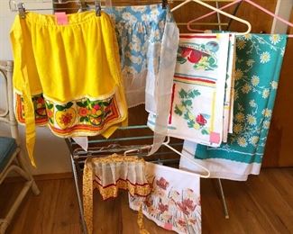 Cute vintage tablecloths & aprons - we have more than shown here!