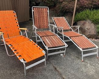 Webbed orange (damage to plastic on arms), redwood & aluminum chaises are SOLD