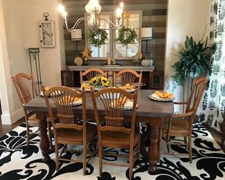 Extendable Dining Table with a grey wash finish and 6 fan-back chairs 