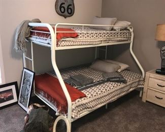 Bunk Bed with full on bottom and twin on top. Includes bedding