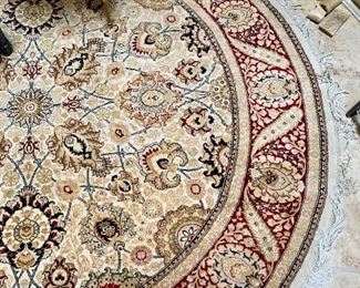 $495 Hand knotted round rug. Made in Pakistan; 6'2"D