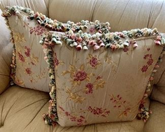 $250 Pair A ; Ebanista Embroidered silk floral pillows with tassel trim. Approx 18" square.