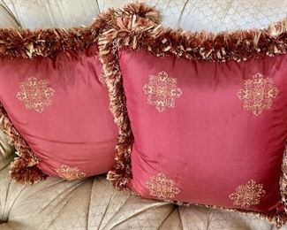 $250 Pair Embroidered red silk pillows with lush fringe trim. Approx 18" square