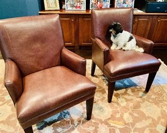 $700 Pair of two leather upholstered arm chairs; 37"H x 24"D x 27"W (dog not for sale!)