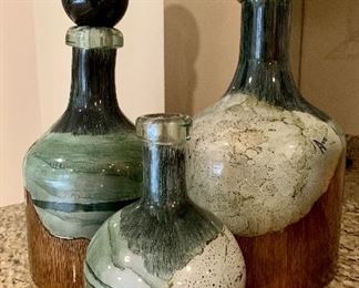 $95 Set of three decorative jars.  As is (one jar missing top) Tallest 18"H, second tallest 15.5"H x smallest 9.5"H