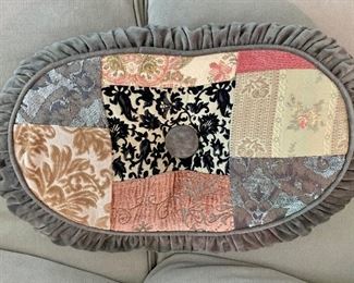 $45 Custom oval patchwork pillow with ruffle trim and tuft; 15"W x 25"L