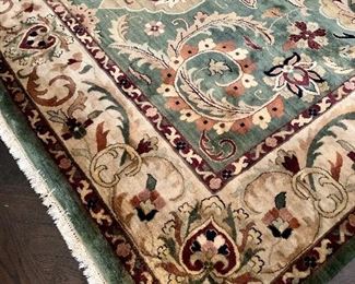 $795 Area rug in greens, taupe and cranberry; 9'10"W x 13'8.5"L