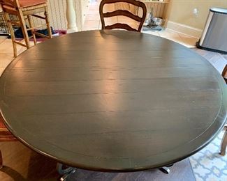 Detail:  French Country wooden topped wrought iron base breakfast table.  60" diameter