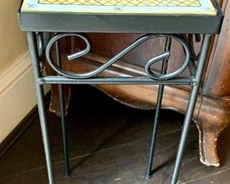 $50 Tile topped metal plant stand. Approx 20"H x 8"W x 8"D.