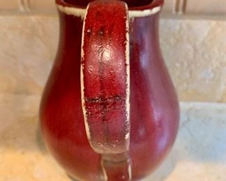 Detail:  Pottery Barn Ceramic Red glazed pitcher (repaired)