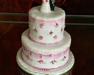 $65  "Wedding Cake" Limoges box; "Print Main Limoges France" inscribed on bottom ; 3.5"H