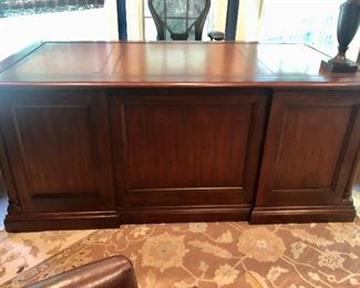 $795 Sligh mahogany pedestal desk; 31"H x 36"D x 72"W