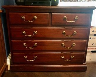 Sligh Two Drawer Lateral file cabinet. Crafted in select mahogany solids and veneers.  Two lockable letter/legal file drawers. Antiqued brass draw pulls.  Approx 42" W x 24" D x 31"H.