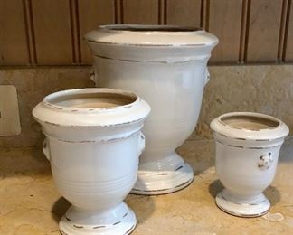 $95 Set of three white glazed planters Tallest 8.75"H, Second tallest 6"H, Smallest 4.5"H