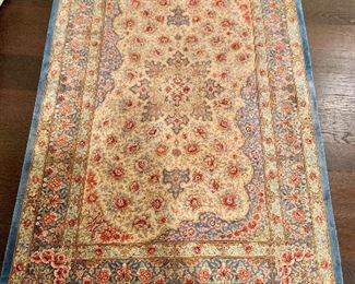 $1,450 Hand knotted signed silk rug; Signed "Iran Qum" ; Beautiful asymetric center; 58"L x 39"W