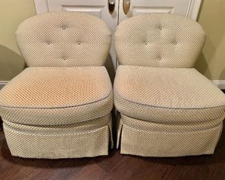 $700 Pair Hickory White arm less swivel chairs with spring down seats and pleated skirt and tufted backs. Reupholstered. 33"H x 37"D x 31"W