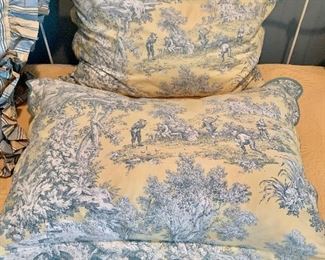 $120 Pair of blue and yellow toile fabric, down pillows 31"W x 22"H