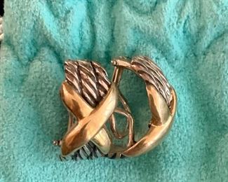$195 Pair sterling silver and 18K clip earrings. Silver Rope design with gold "x". "925" and "18K" stamped on reverse.