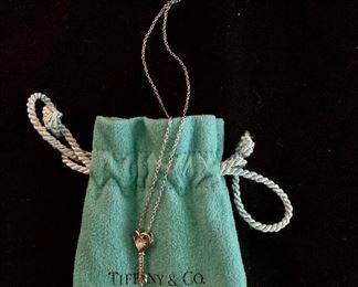 $50 Tiffany Sterling silver youth necklace with key pendant.