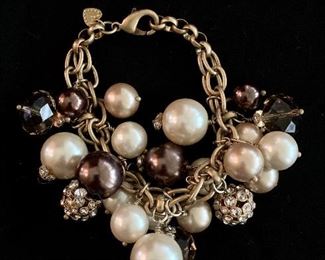 $25 Fashion bracelet with faux glass, pearl and rhinestone baubles.