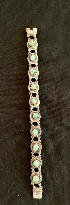 $40 Silver and turquoise bracelet with slide clasp.  Stamped 925. 