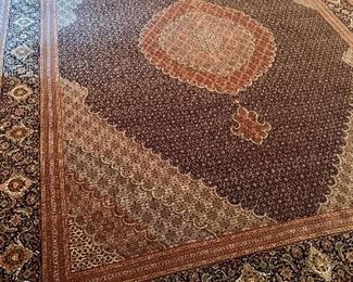 Detail:  Hand woven Tabriz rug.