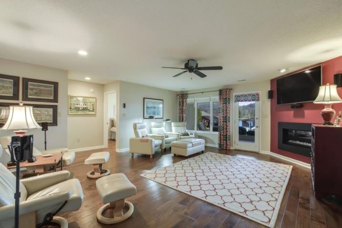 Stressless three-seat reclining sofa and matching ottoman/coffee table. Excellent condition.