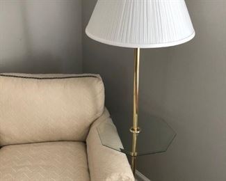 Floor lamp with glass table.