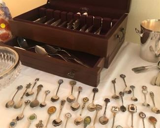 Silver plate and more spoons.