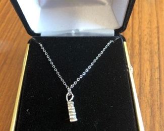 10KT White Gold 1/8 Carat 3 Stone Diamond Pendant