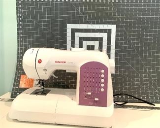 Singer “Curvy” sewing machine.