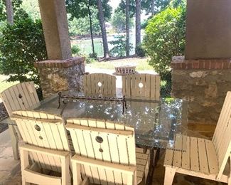 Outdoor glass top table and six wood chairs