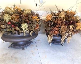 oversized dried flower arrangements in extremely heavy iron pots
