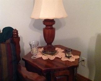 Octagonal table, hand crocheted doilies, candle holders