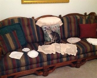 Sofa, pillows and doilies