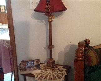 Antique Demi- table, hand croucheted doily, lamp, and books