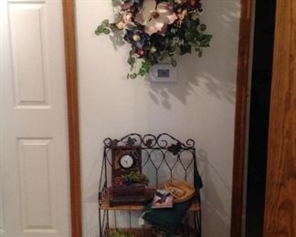 Wreath, shelving unit, mini chest with clock, decorative items