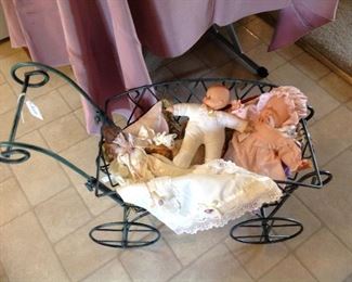 Metal doll carriage, mini pillows and vintage dolls