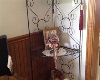 Corner folding metal shelving unit, decorative items and doilies